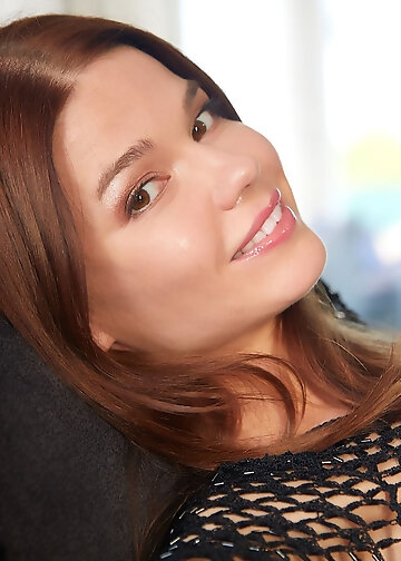 Pretty Nedda reveals her juicy pink pussy in a detailed view