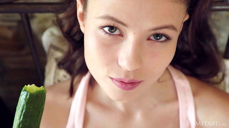 Beautiful girl perform morning exercises naked in the bed