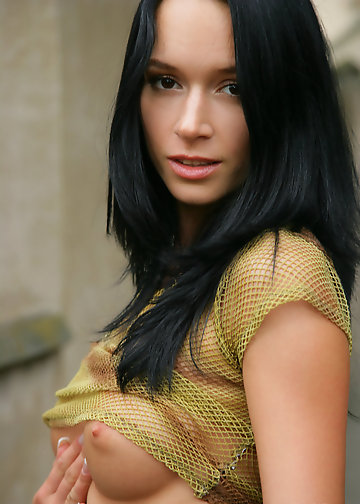 Stunner isn't afraid to flash her great tits on the public street