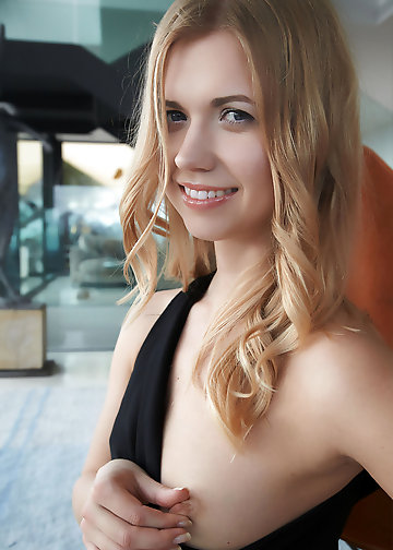 Joyful babe showing bald pussy and nice tits without taking off black dress