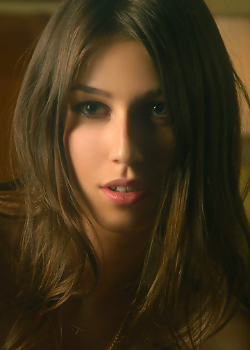 Beautiful pics of svelte brunette wearing sexy lingerie while being alone at home