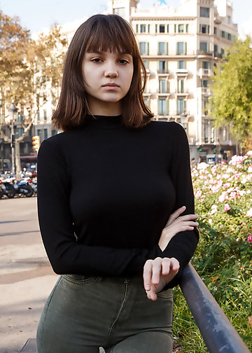 Teen with trimmed twat advertises all charms by the brick wall