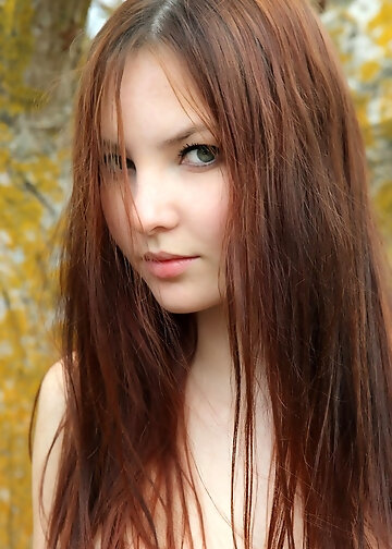 Outdoor naked pics of the red-haired girl with green eyes and hairy pussy