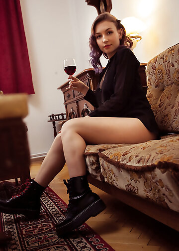 Lovely with dyed hair and red lips deserves likes for the nude pictures