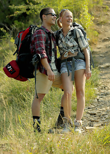 Camper and his pretty blonde girlfriend set up the tent and practice sex inside