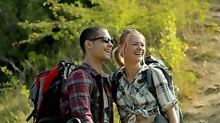 Camper and his pretty blonde girlfriend set up the tent and practice sex inside