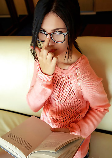 Girl with crazy eyes exposes secret parts and puts fingers into her shaved snatch