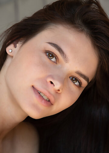 Young brunette's nude photoshoot makes her get naked