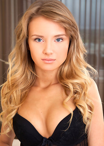 Naked photos of petite sweetie with wavy hair and small boobs