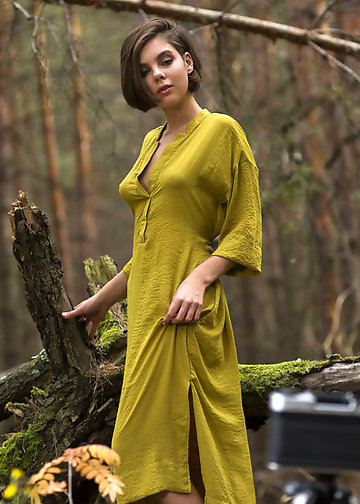 Aspiring photographer with short hair turns into an exhibitionist in the forest