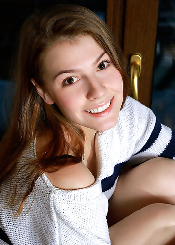 Shy babe reads a book and completely undresses herself