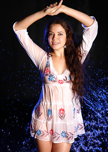 Adorable teen not shy to strip naked under streams of water