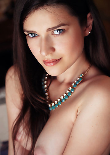 Blue-eyed doll's slender body looks best when she is nude